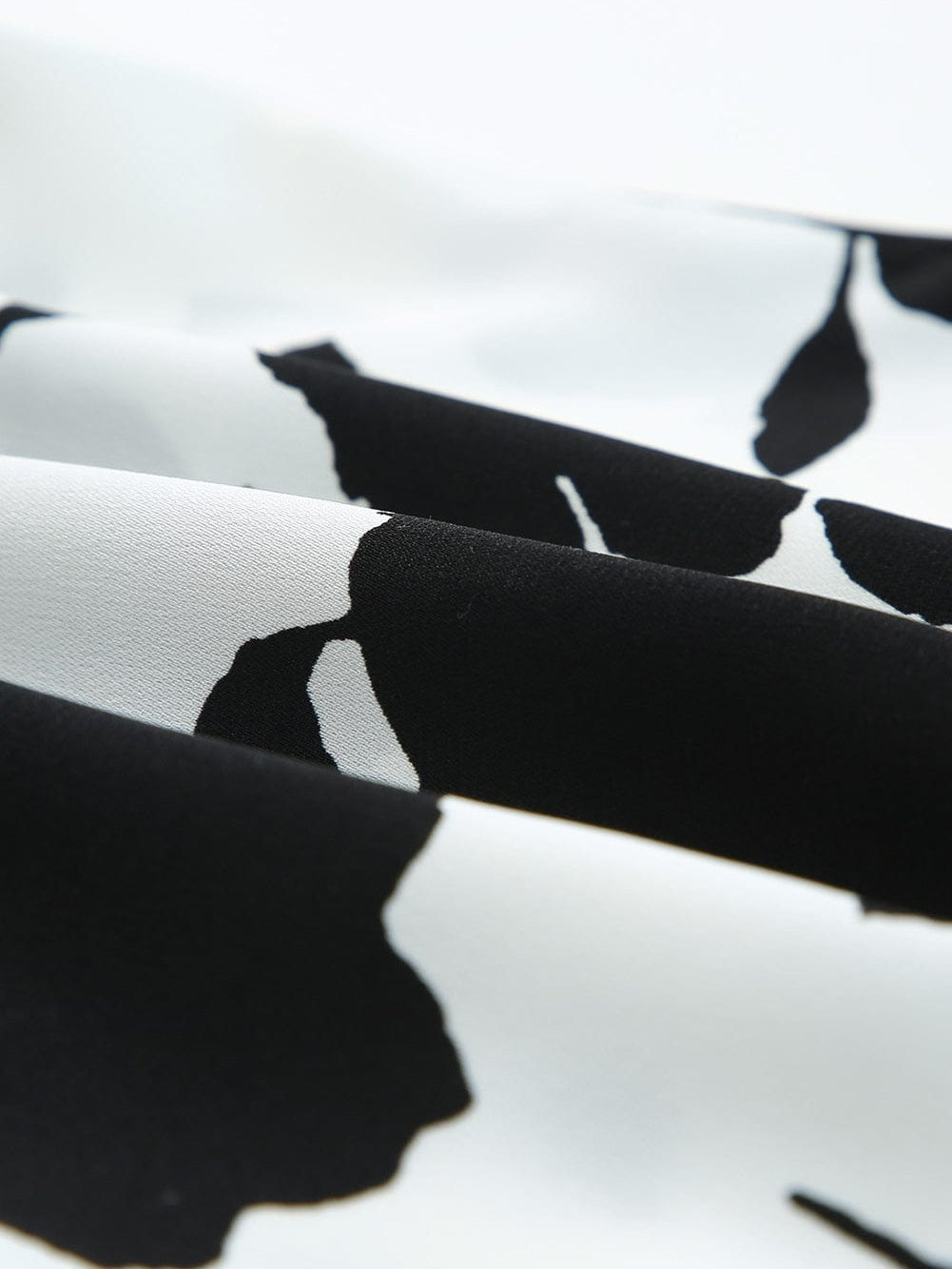 Elegant White Floral Button-Up Tank with Tie Detail