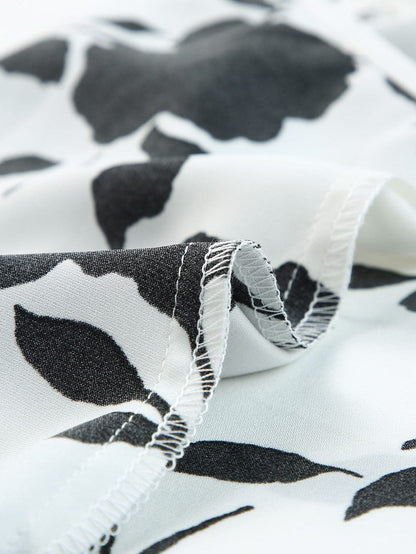 Elegant White Floral Button-Up Tank with Tie Detail