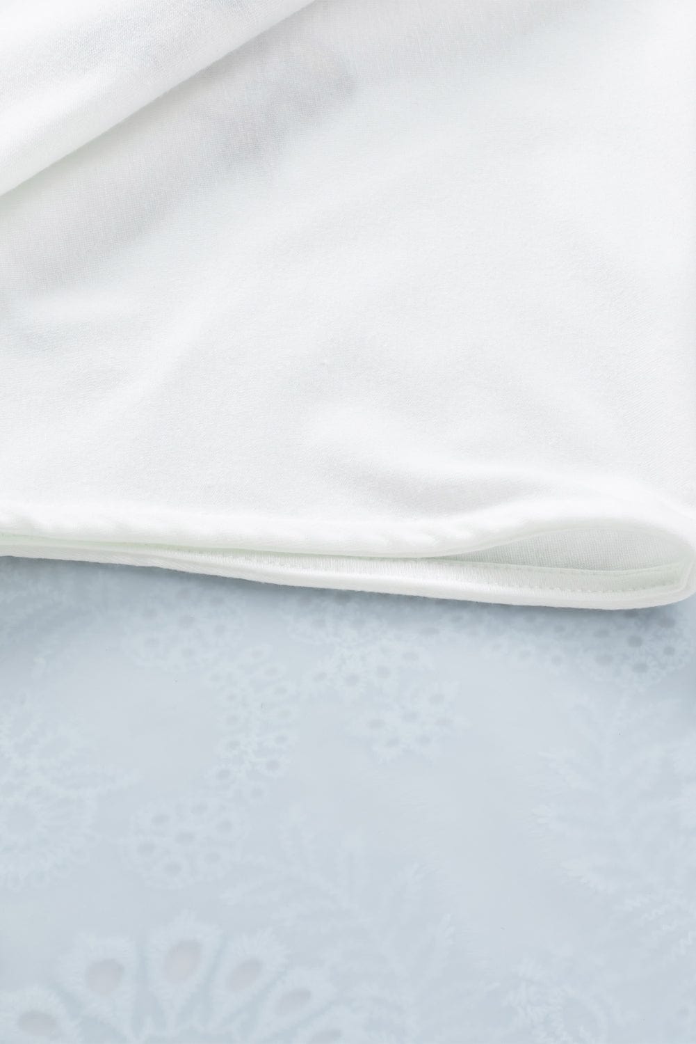 Elegant White Floral Embroidered V-Neck Babydoll Top