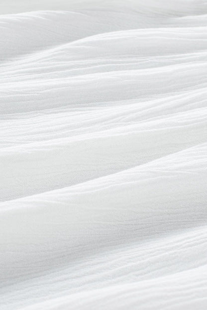 Elegant White Floral Embroidered V-Neck Babydoll Top