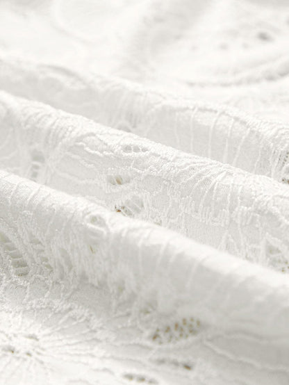 Elegant White Floral Eyelet Keyhole Top with Ruffle Detail