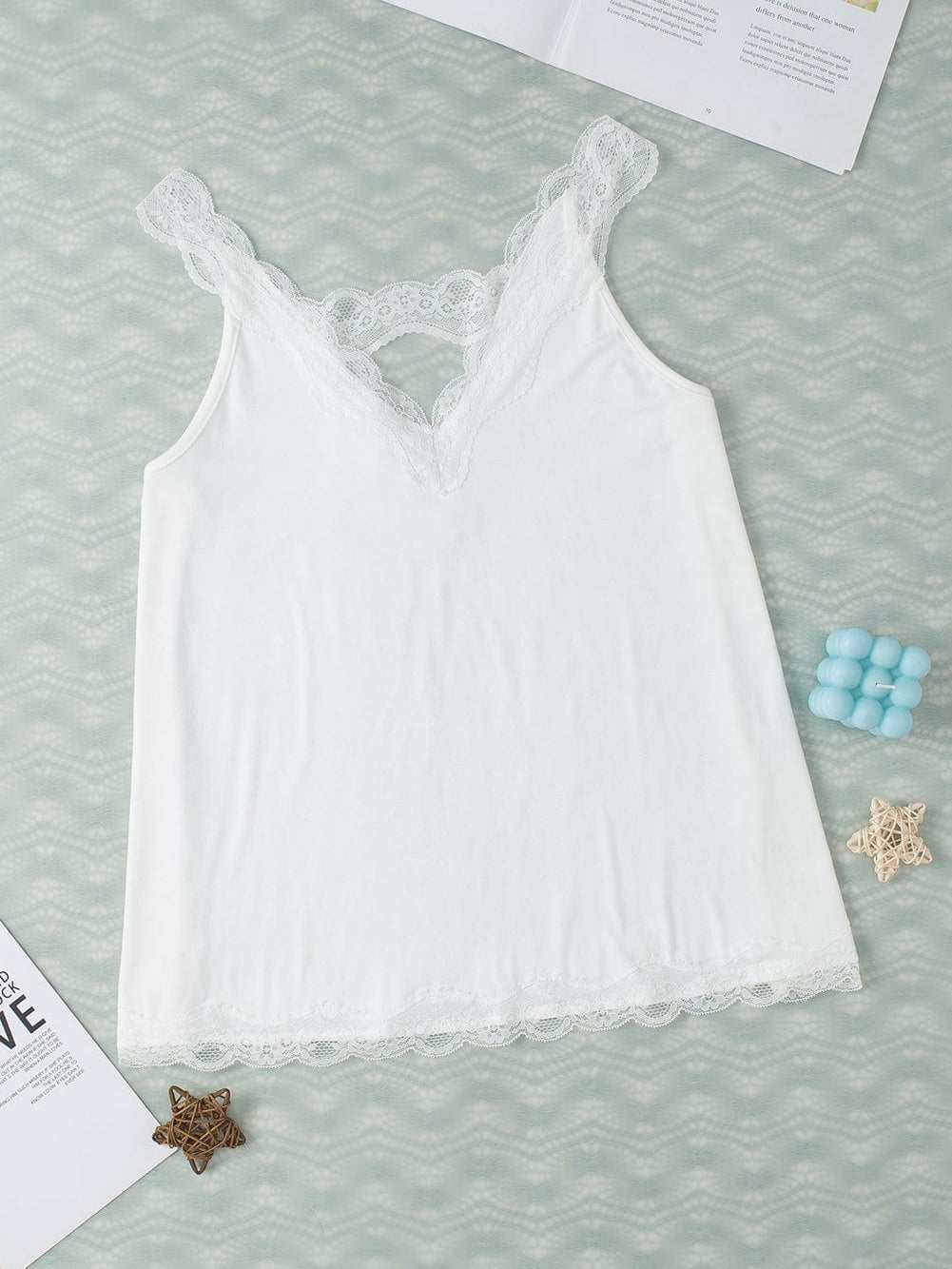 Elegant White Lace-Trimmed Flare Sleeveless Top