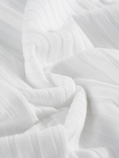 Elegant White Swiss Dot Ribbed Puff Sleeve Bodysuit