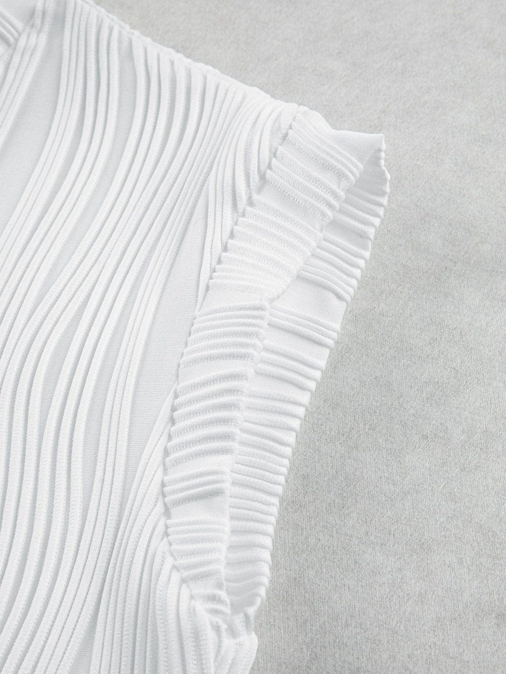 Elegant White Textured Cap Sleeve Blouse