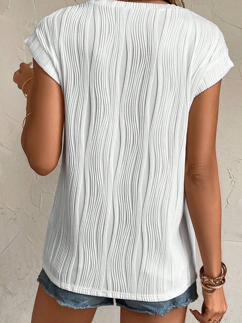 Elegant White Textured Cap Sleeve Blouse