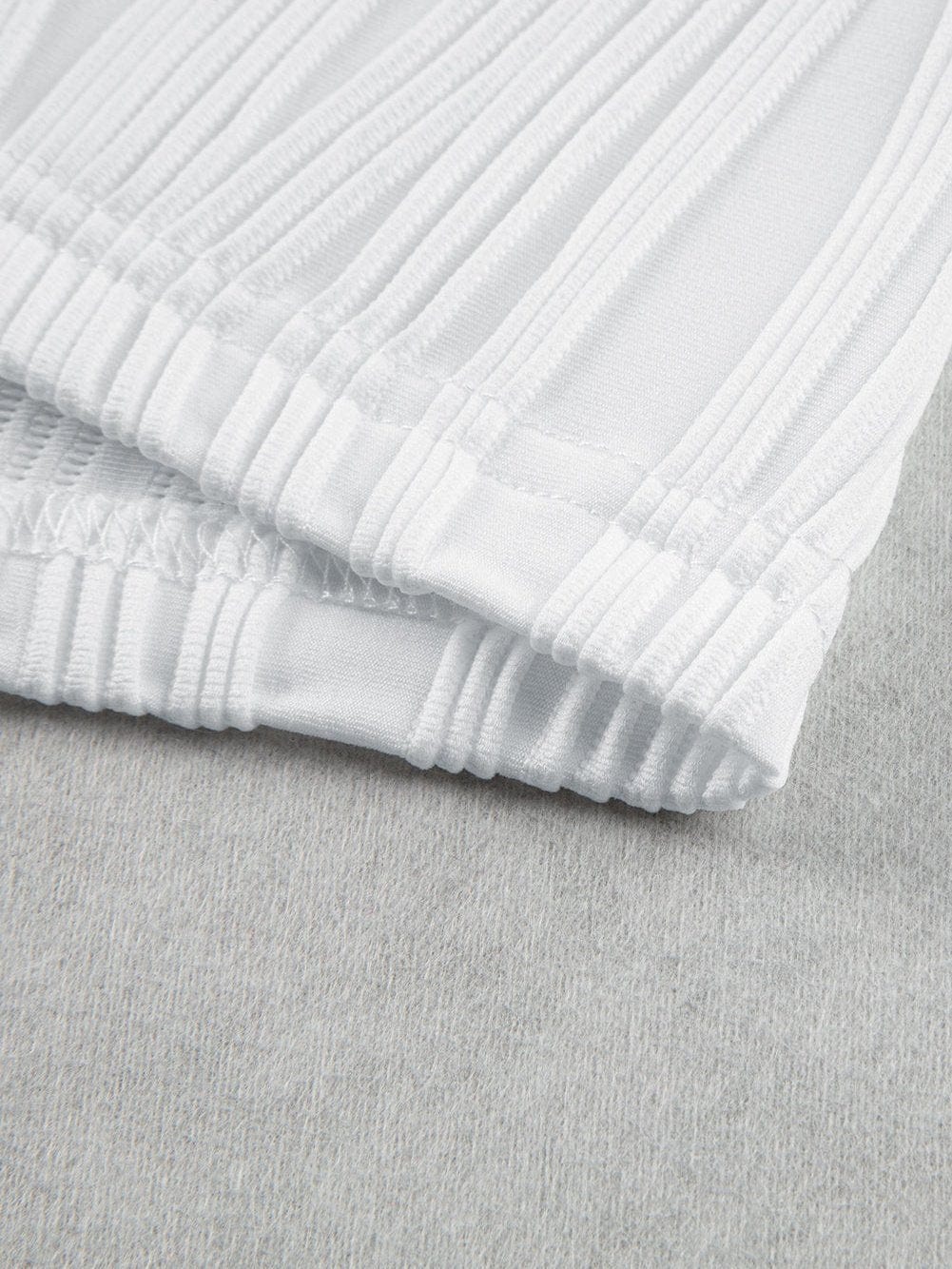 Elegant White Textured Cap Sleeve Blouse