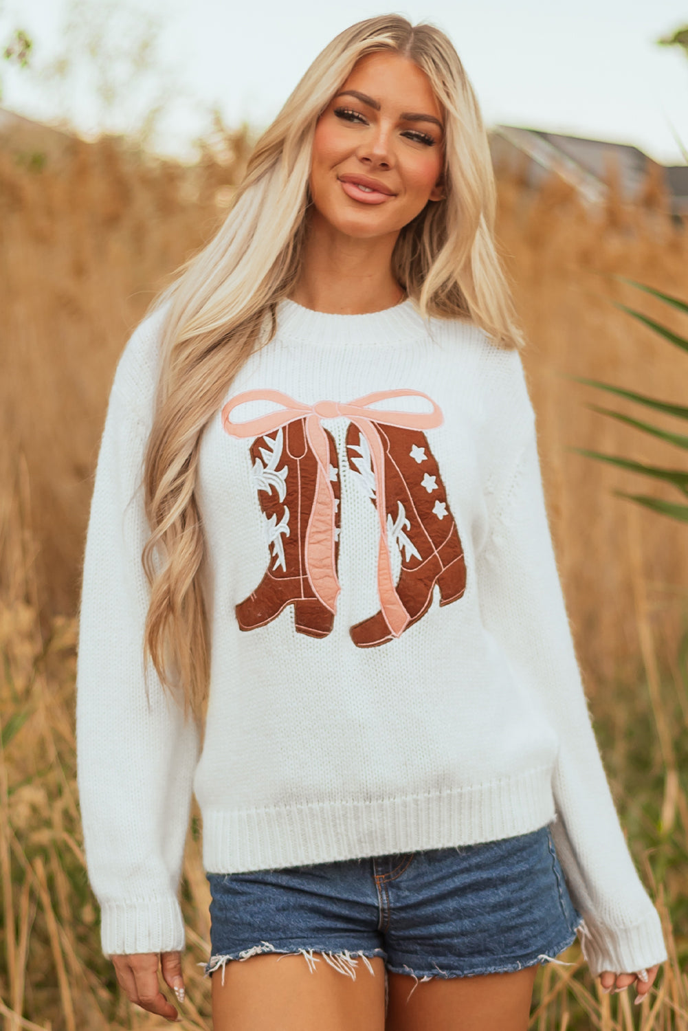white embroidered sweater