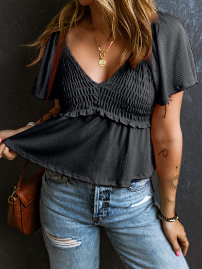 Flirty Black Textured Peplum Blouse with V Neck and Flutter Sleeves