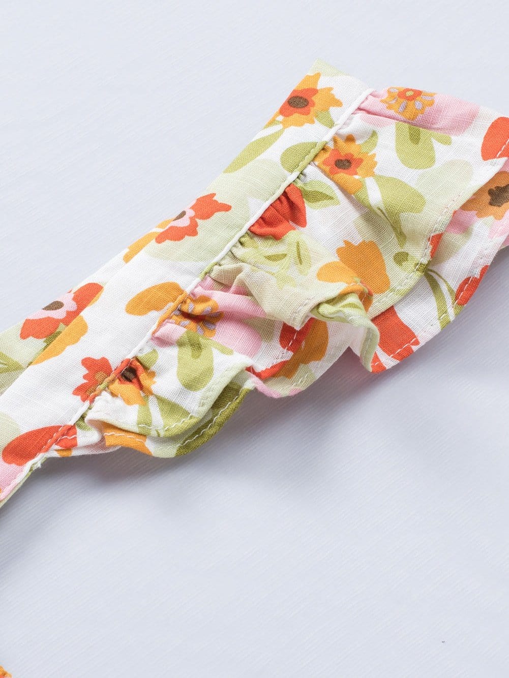 Floral Fantasy Sleeveless Ruffled Mini Dress