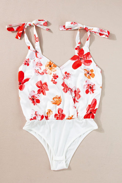 Floral Wrap Sleeveless Bodysuit with White Button Accent