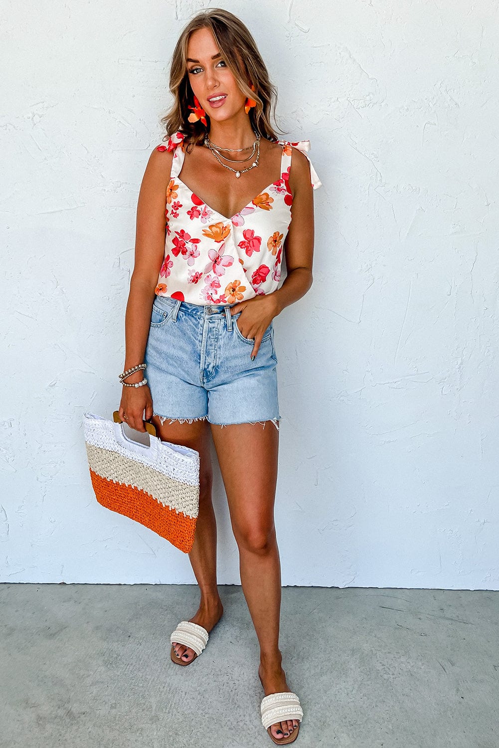 Floral Wrap Sleeveless Bodysuit with White Button Accent