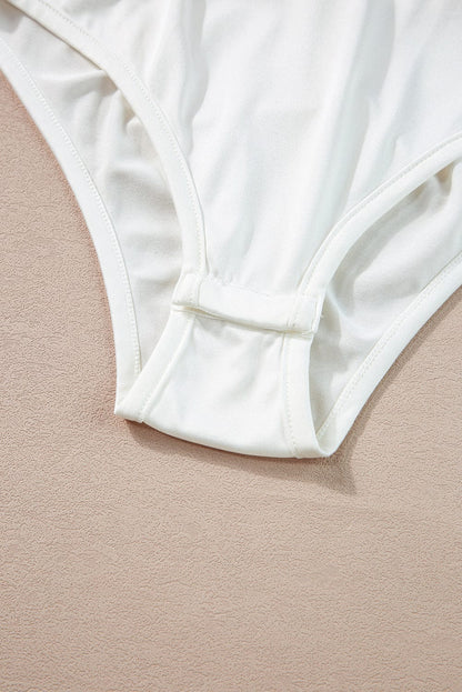 Floral Wrap Sleeveless Bodysuit with White Button Accent