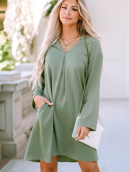 Flowy Green V-Neck Casual Dress with Roll-Tab Sleeves