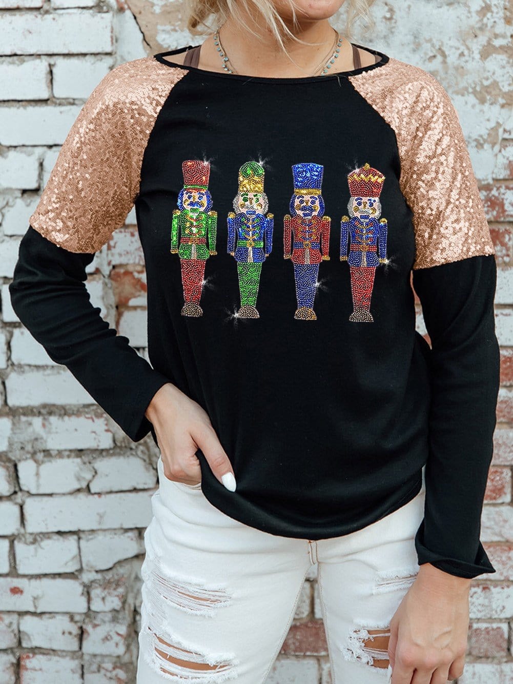 Glittery Black Nutcracker Graphic Top with Sequined Sleeves