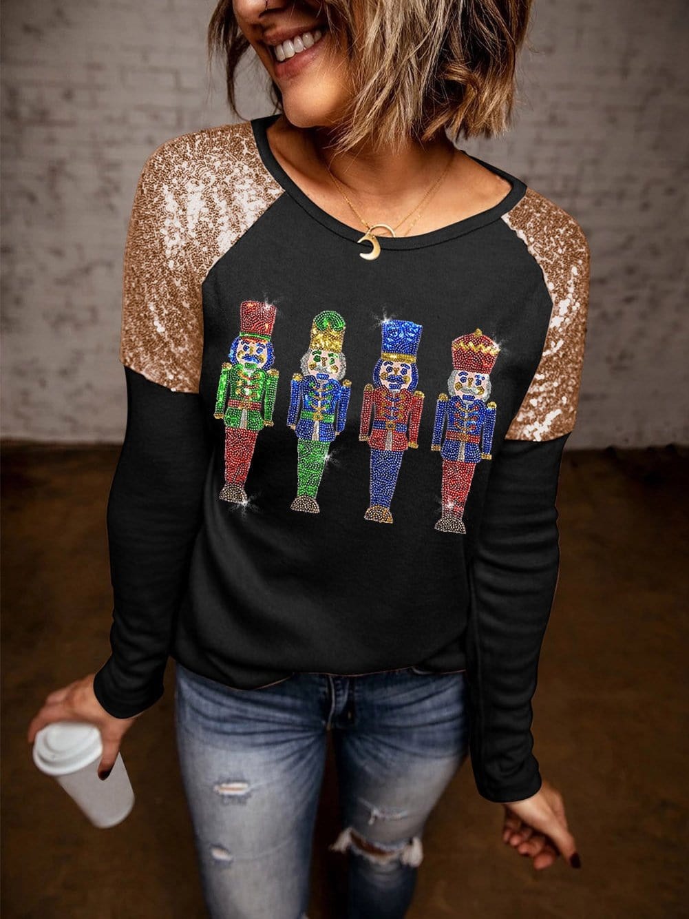 Glittery Black Nutcracker Graphic Top with Sequined Sleeves