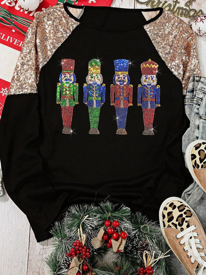 Glittery Black Nutcracker Graphic Top with Sequined Sleeves