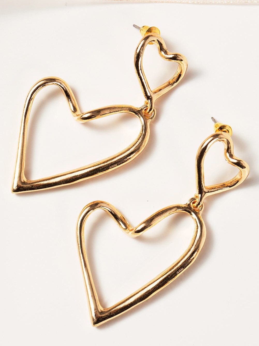 Golden Heart-Shaped Alloy Stud Earrings with Unique Design