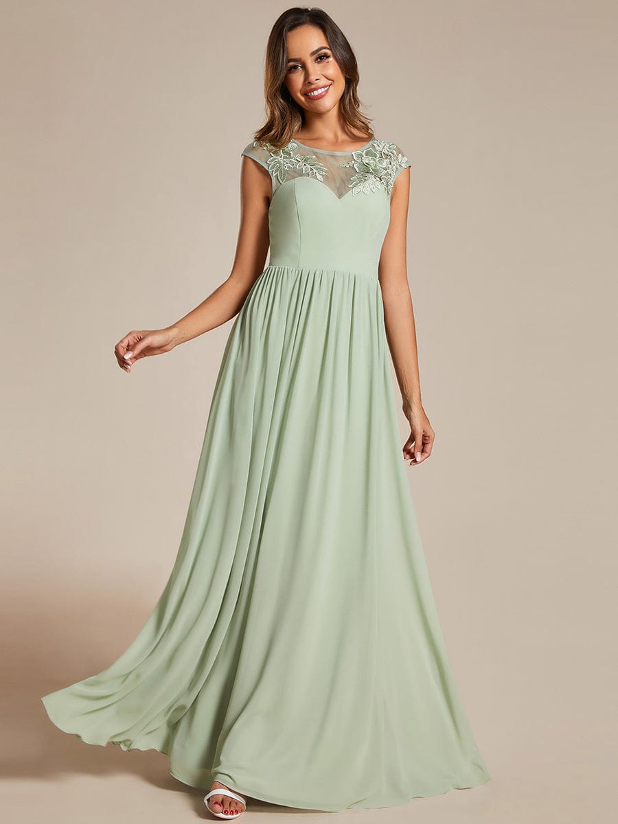 Graceful Chiffon Evening Gown with Cap Sleeves and Shoulder Applique