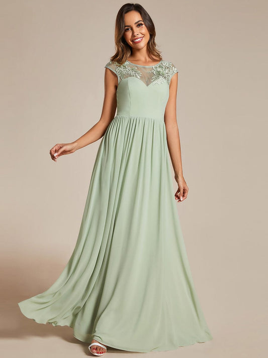 Graceful Chiffon Evening Gown with Cap Sleeves and Shoulder Applique