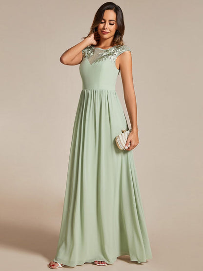Graceful Chiffon Evening Gown with Cap Sleeves and Shoulder Applique