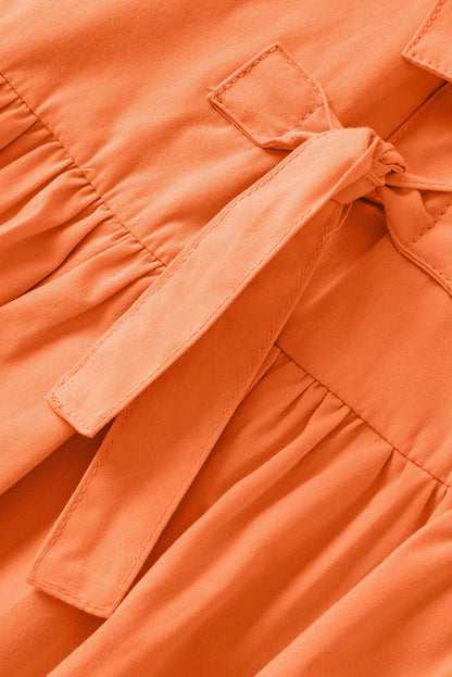 Grapefruit Orange Knotted Puff Peplum Blouse with Short Sleeves