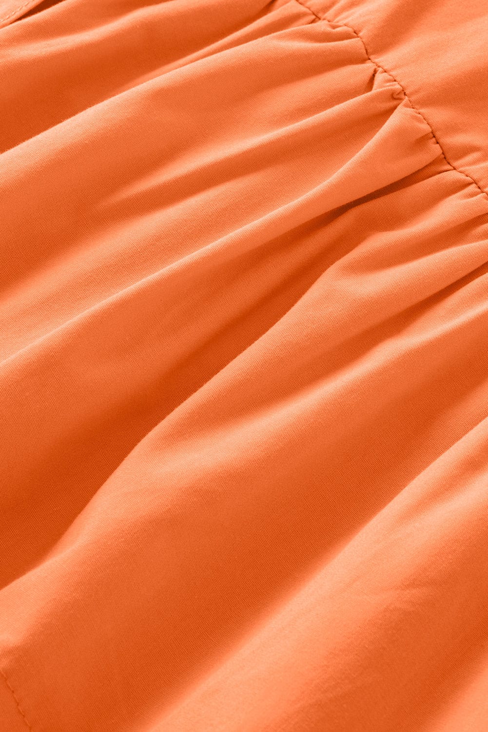 Grapefruit Orange Knotted Puff Peplum Blouse with Short Sleeves