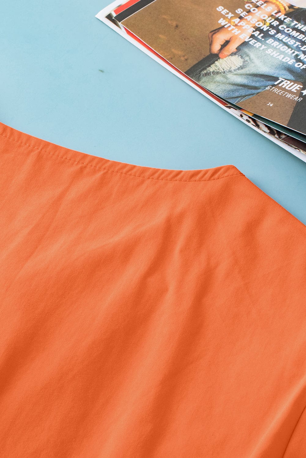 Grapefruit Orange Knotted Puff Peplum Blouse with Short Sleeves