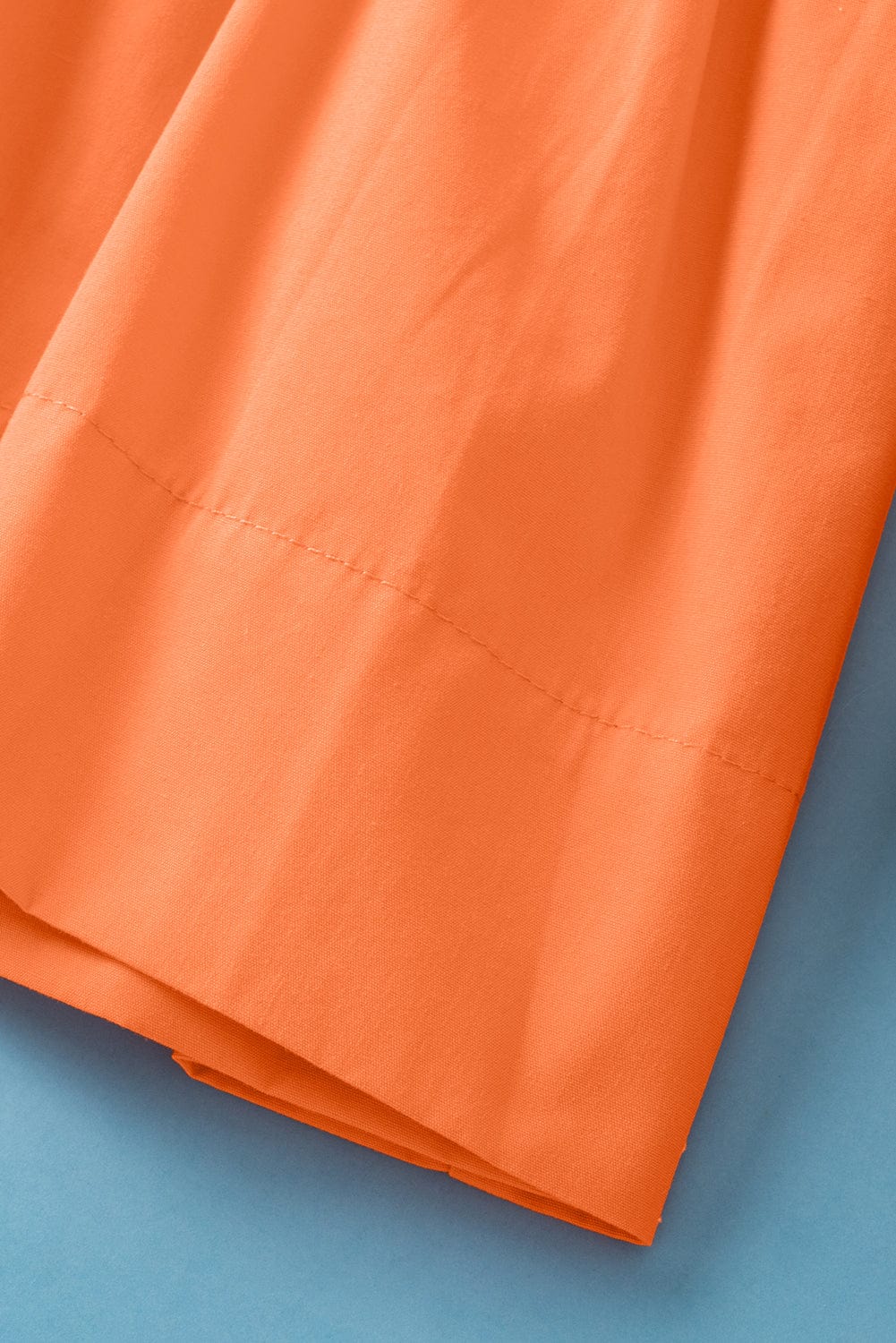 Grapefruit Orange Knotted Puff Peplum Blouse with Short Sleeves