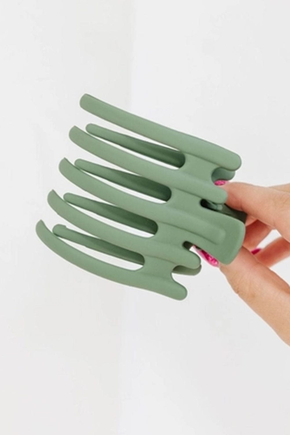 Green 5-Prong Plastic Hair Claw for Versatile Hairstyles