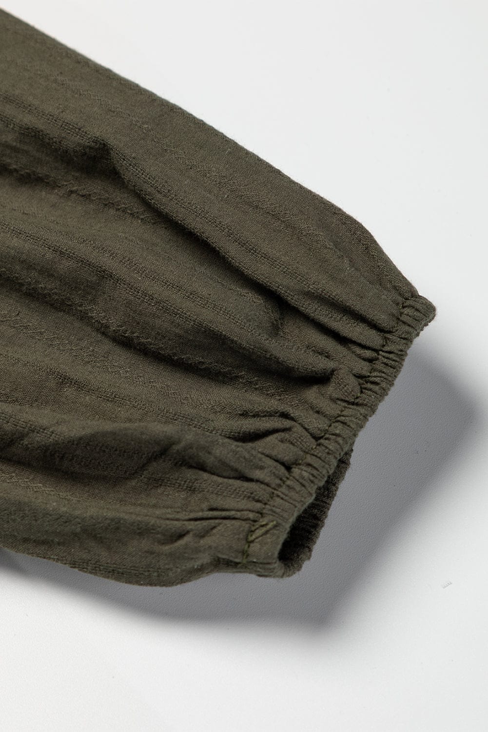 Green Floral Embroidered Bohemian Blouse with Tasseled Neckline