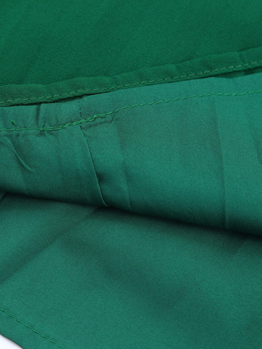 Green Pleated Halter Neck Wide Leg Jumpsuit with Stylish Belt