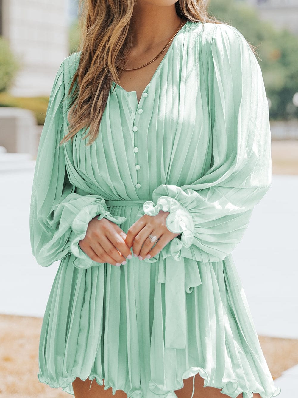 Green Pleated V-Neck Romper with Tie Waist and Ruffled Details