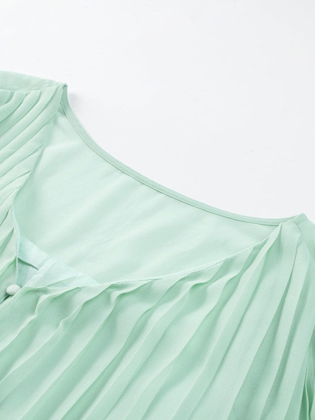 Green Pleated V-Neck Romper with Tie Waist and Ruffled Details