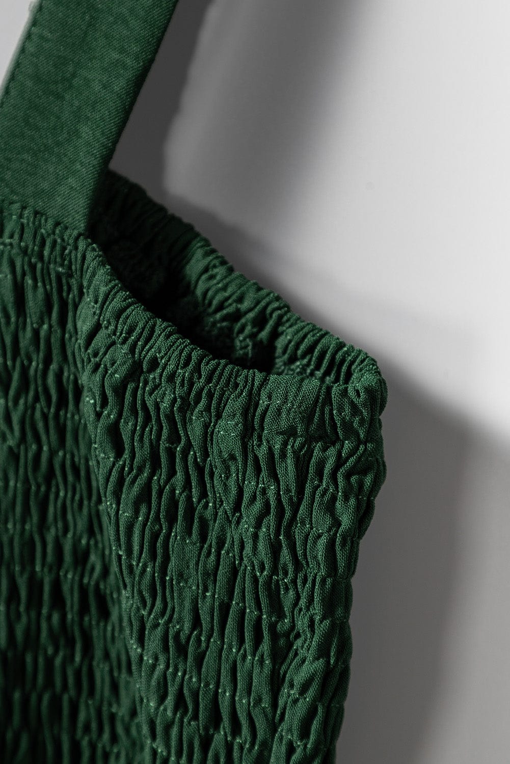 Green Smocked Sleeveless Jumpsuit with Wide Leg and Pockets