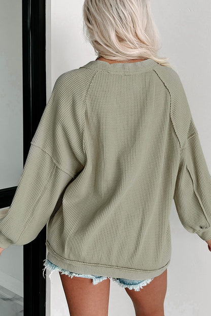 Green Waffle Knit Cardigan with Exposed Seams and Button Detail