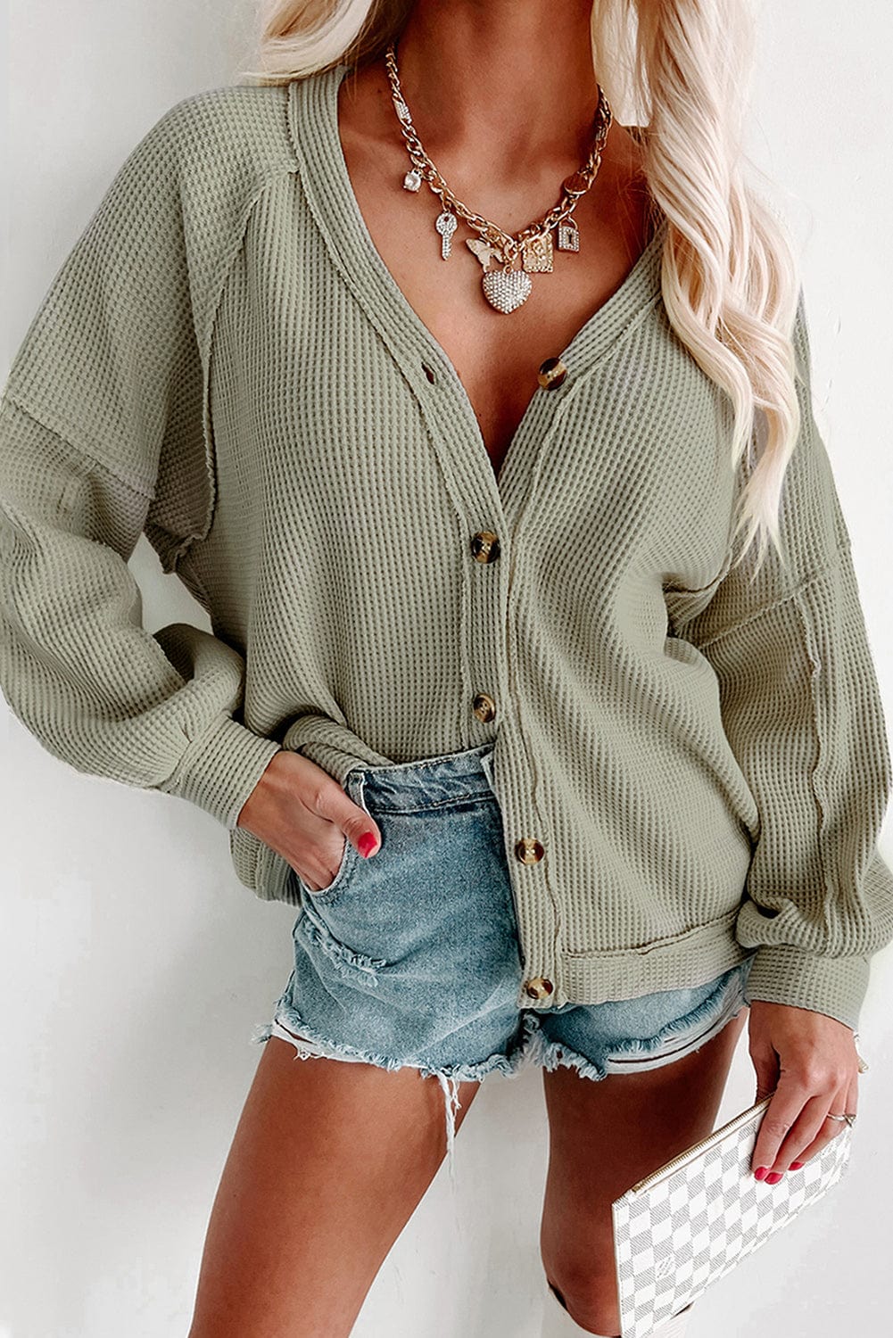 Green Waffle Knit Cardigan with Exposed Seams and Button Detail