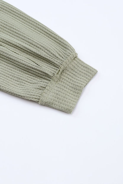 Green Waffle Knit Cardigan with Exposed Seams and Button Detail