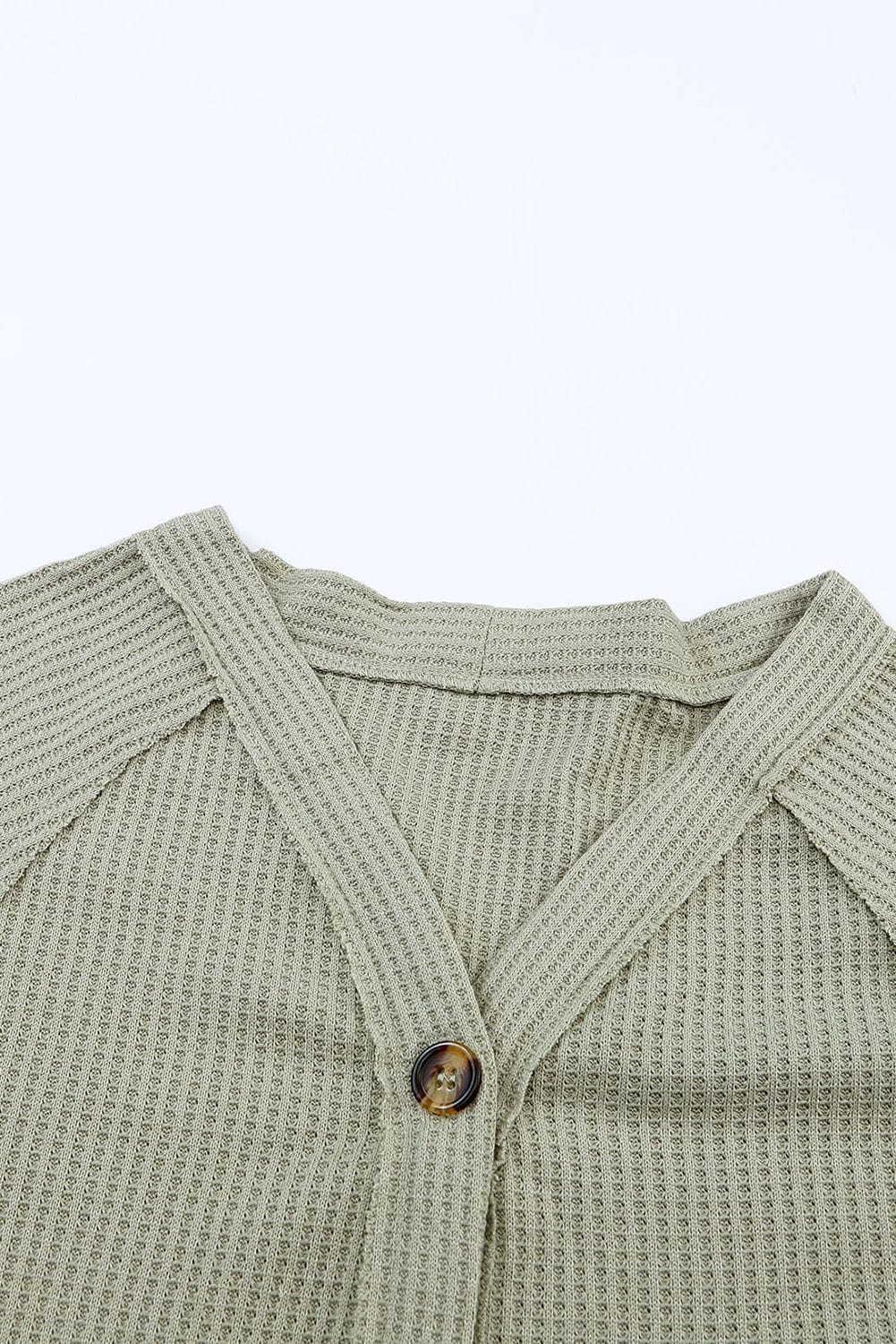 Green Waffle Knit Cardigan with Exposed Seams and Button Detail