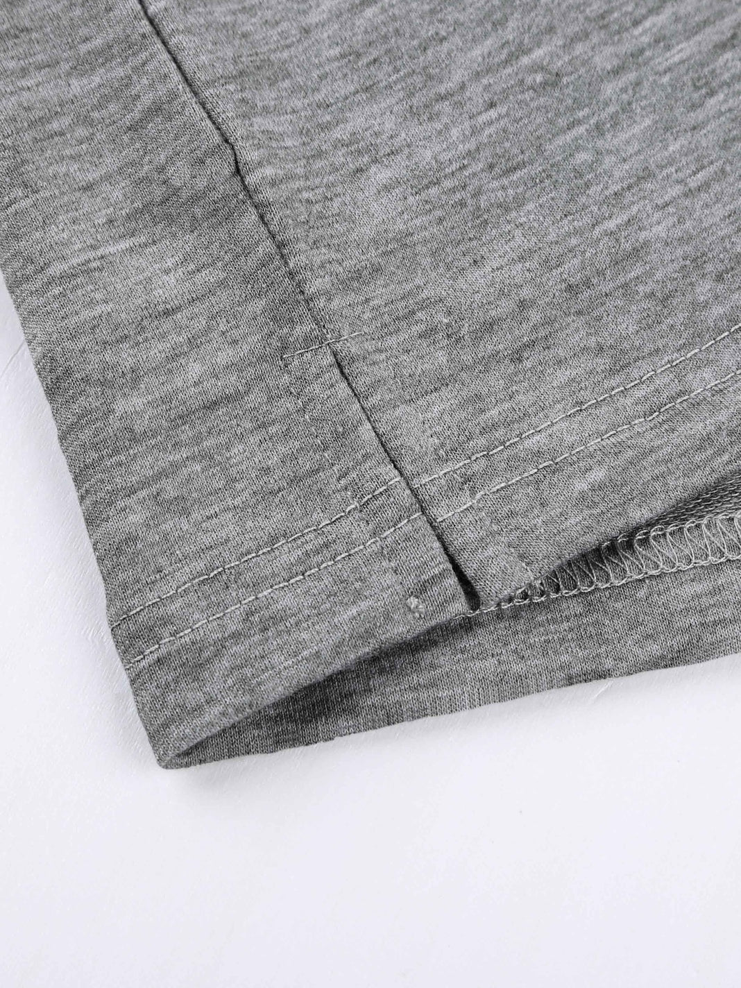 Hypnotic Knit Pocket Tee with Side Slits