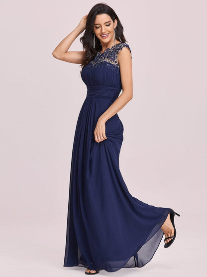 Lacey Neckline Open Back Evening Gown with Ruched Bust