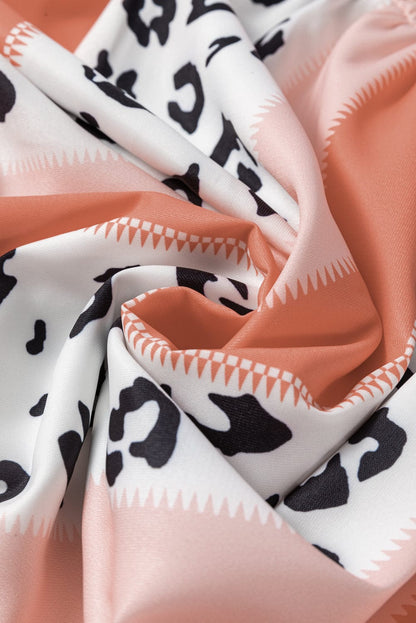 Leopard Print Smocked Fit and Flare Dress in Orange