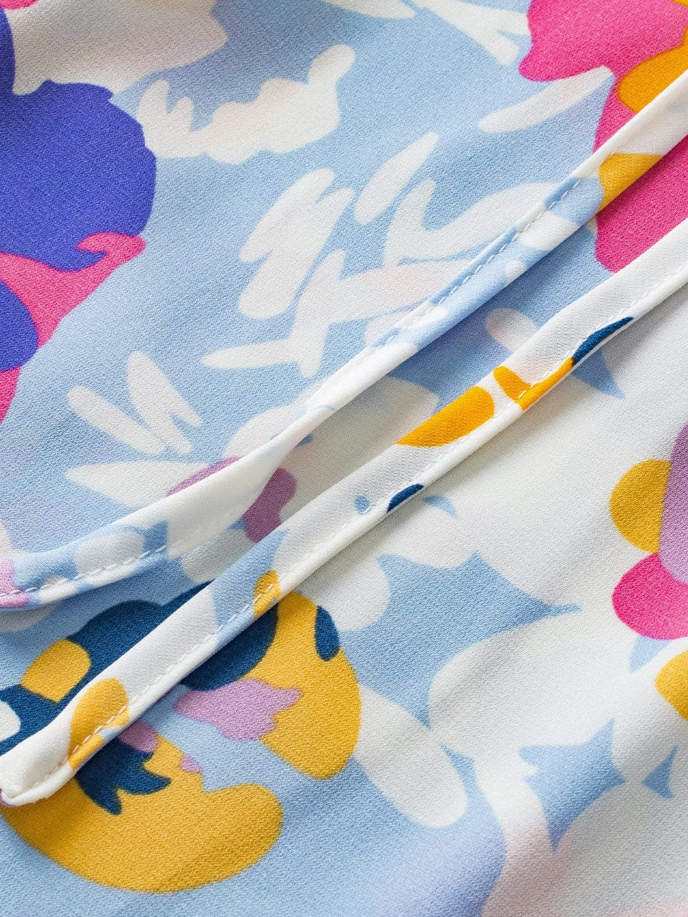 Light Blue Floral Flutter Sleeve V-Neck Blouse with Ruffle Details