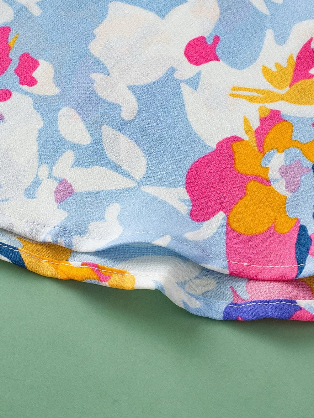 Light Blue Floral Flutter Sleeve V-Neck Blouse with Ruffle Details