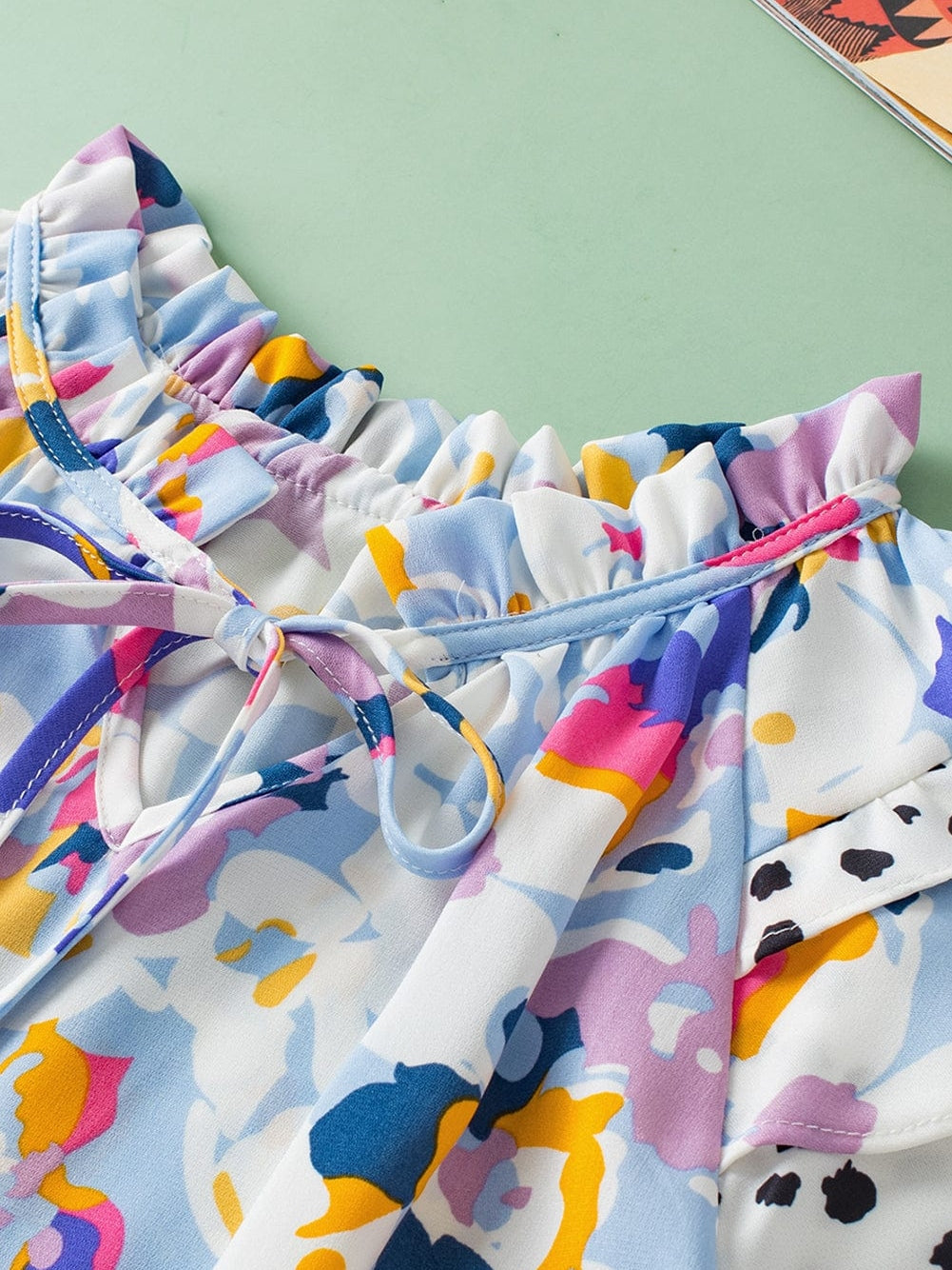 Light Blue Floral Flutter Sleeve V-Neck Blouse with Ruffle Details