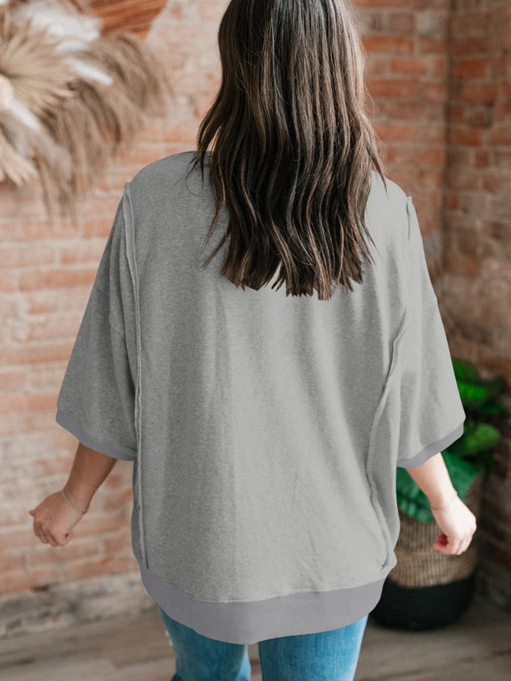 Modern Light Grey Oversized Split Pocket Tee with Exposed Seams