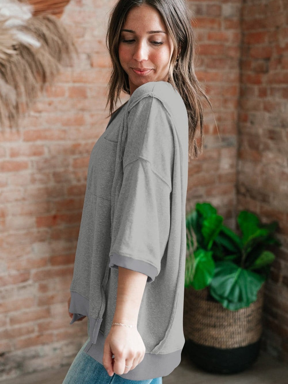 Modern Light Grey Oversized Split Pocket Tee with Exposed Seams