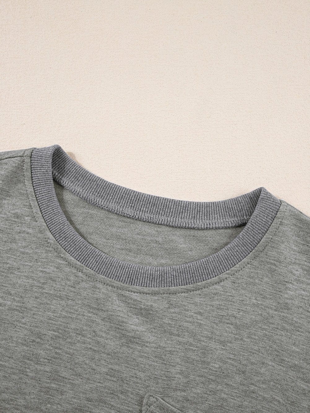 Modern Light Grey Oversized Split Pocket Tee with Exposed Seams