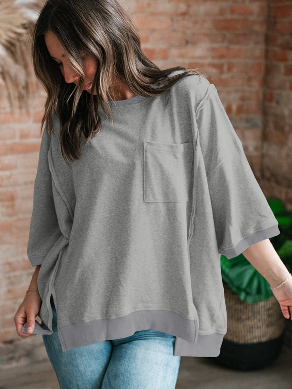 Modern Light Grey Oversized Split Pocket Tee with Exposed Seams