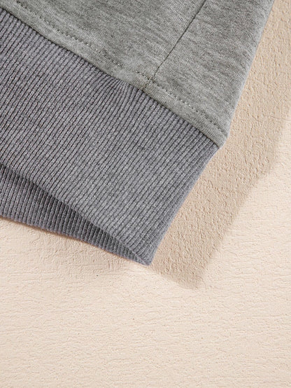 Modern Light Grey Oversized Split Pocket Tee with Exposed Seams