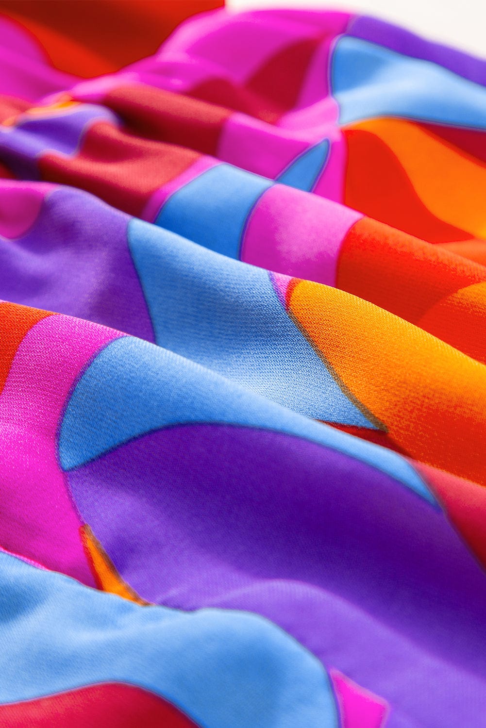 Orange Abstract Print Peplum Blouse with Flutter Sleeves